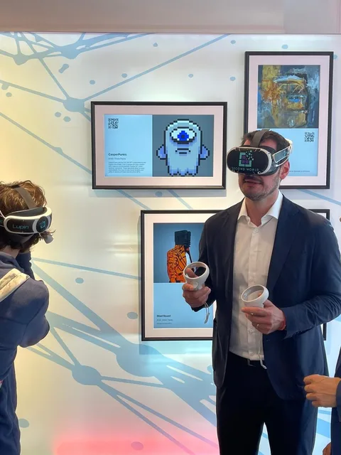 Photo of a visitor in a VR headset experiencing the NFT gallery wall at the built venue
